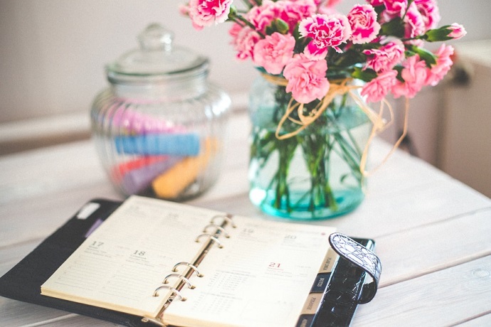 The benefits of being self-employed. Diary on a table