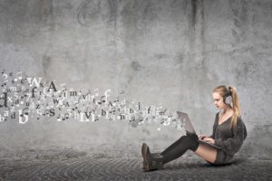 girl sitting on the floor using different learning styles