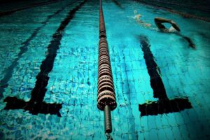 Olympic Games. Swimmer in a pool