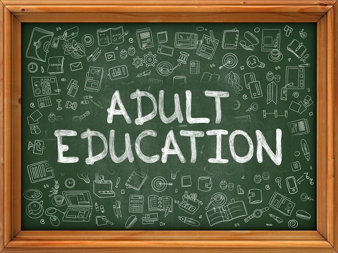Adult Education - Hand Drawn on Green Chalkboard with Doodle Icons Around. Modern Illustration with Doodle Design Style.